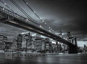 Brooklyn Bridge and lower Manhattan skyline at dusk, New York