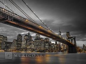 Brooklyn Bridge and lower Manhattan skyline at dusk, New York