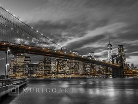 Brooklyn Bridge and lower Manhattan skyline at dusk, New York
